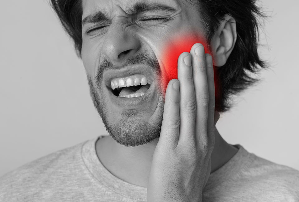 man with tooth pain